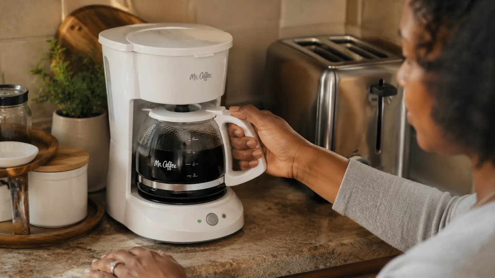 Mr. Coffee 5-Cup Mini on a tight apartment counter next to a toaster