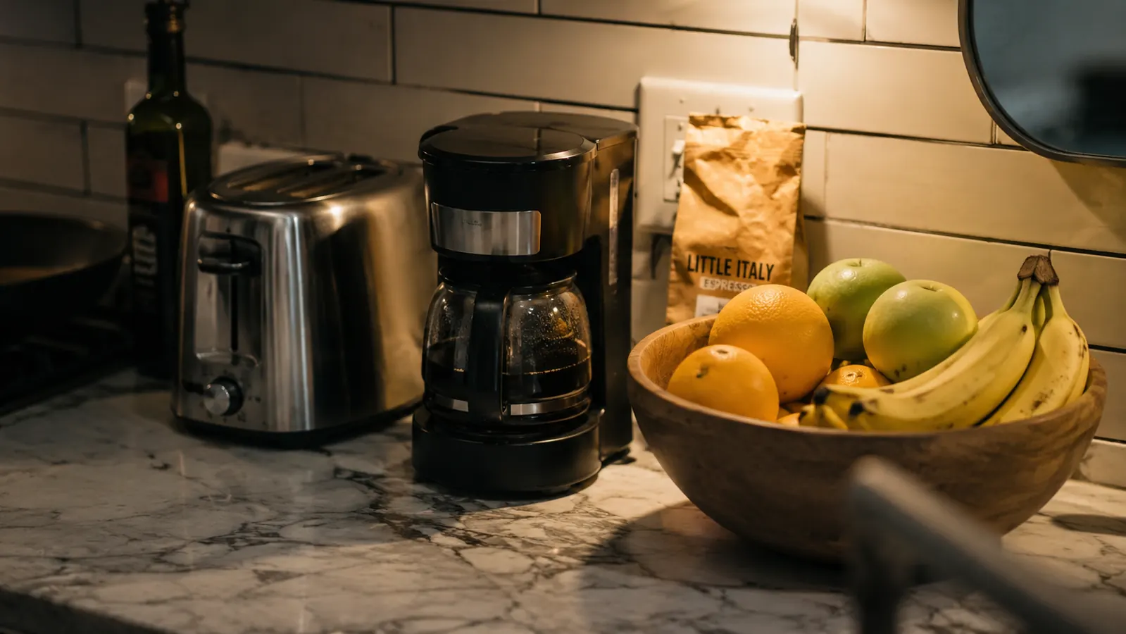 Coffee maker on a narrow kitchen shelf with limited counter space in a small apartment